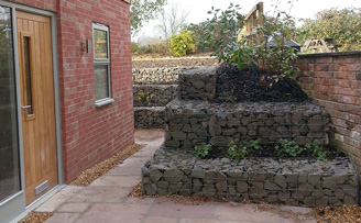 Mr Gleaves' Planted garden retaining wall